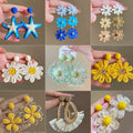 Holiday Island Handmade Sunflower Raffia Grass Earrings Seaside Personality Exaggerated Big Flower Earrings Earrings Wholesale - front view